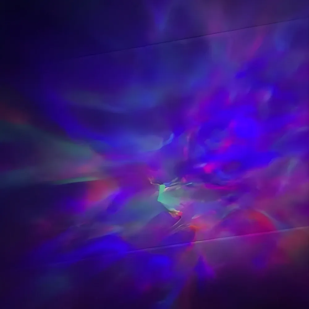 projected a soft galaxy onto the ceiling